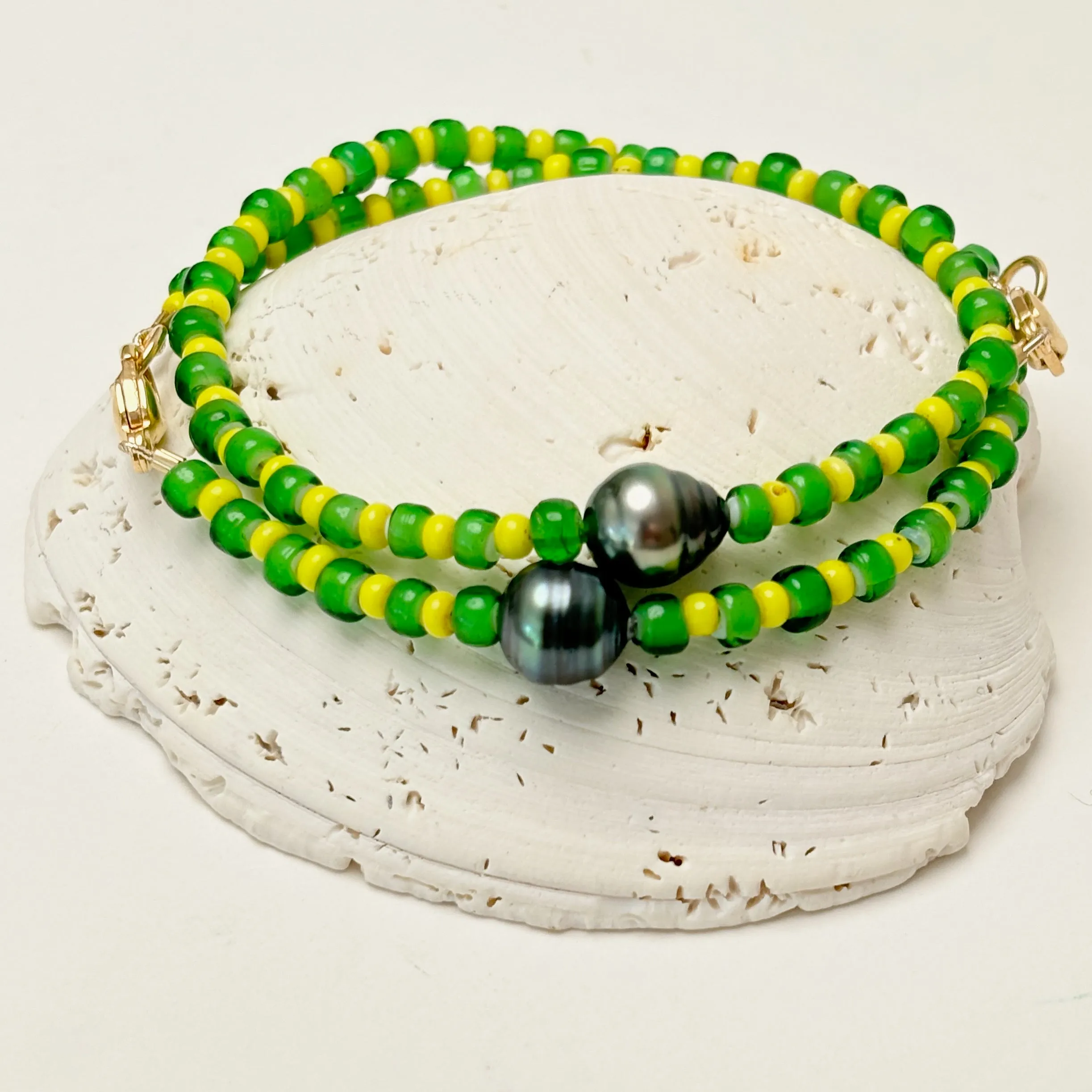 green and yellow and tahitian pearl bracelet