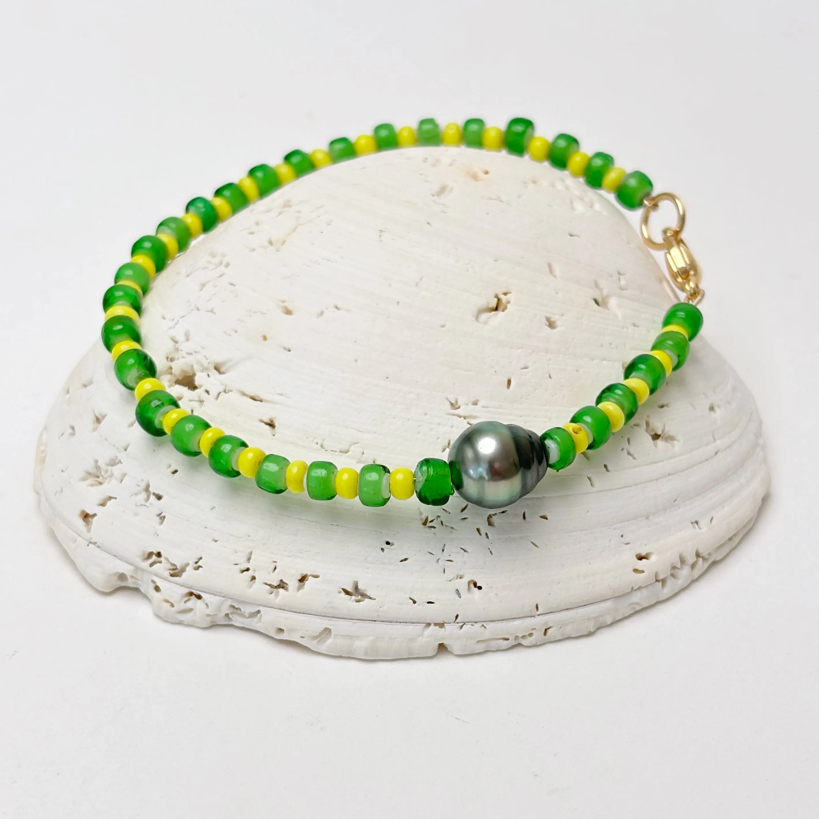 green and yellow and tahitian pearl bracelet