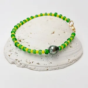 green and yellow and tahitian pearl bracelet