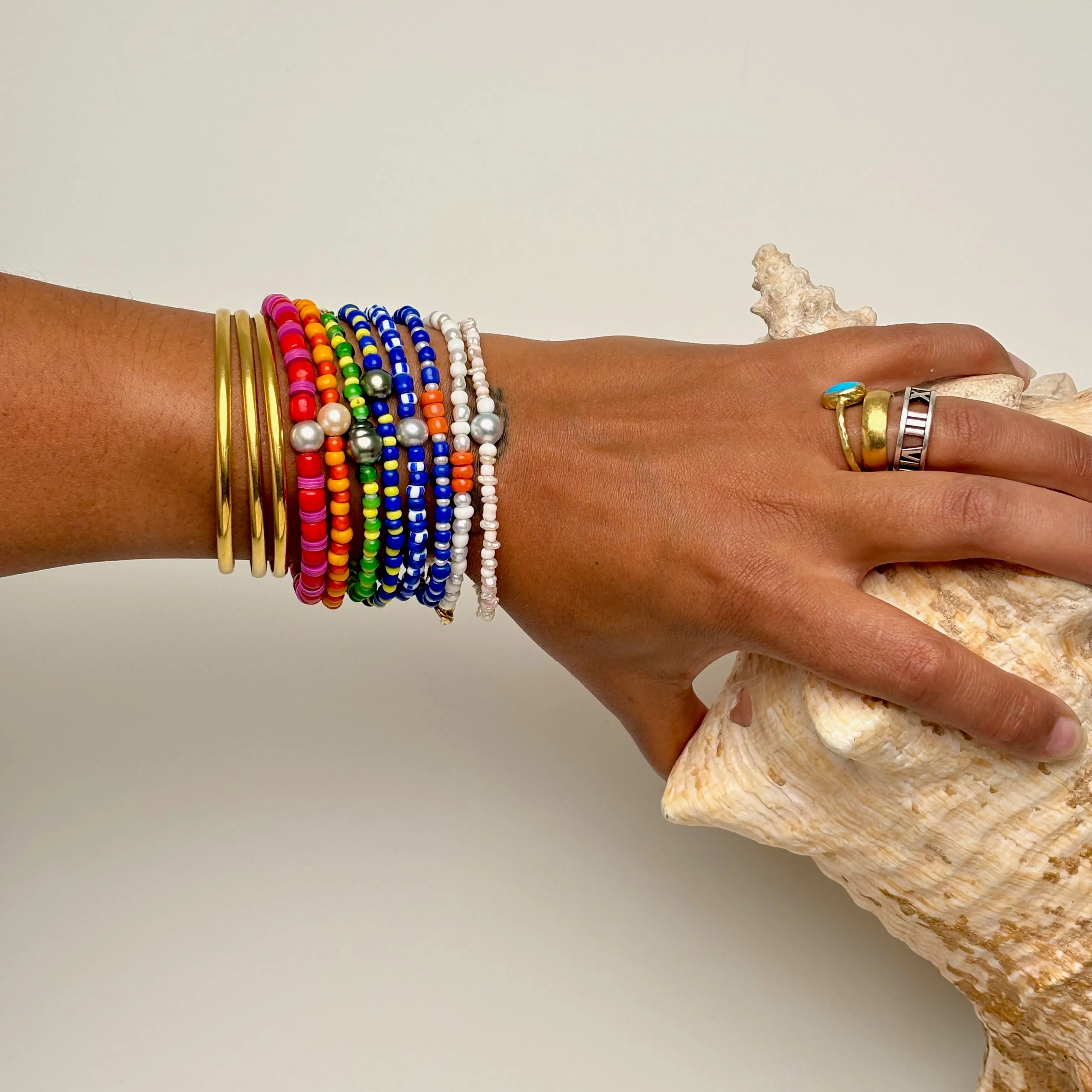 green and yellow and tahitian pearl bracelet